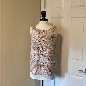 Business causal sleeveless blouse.